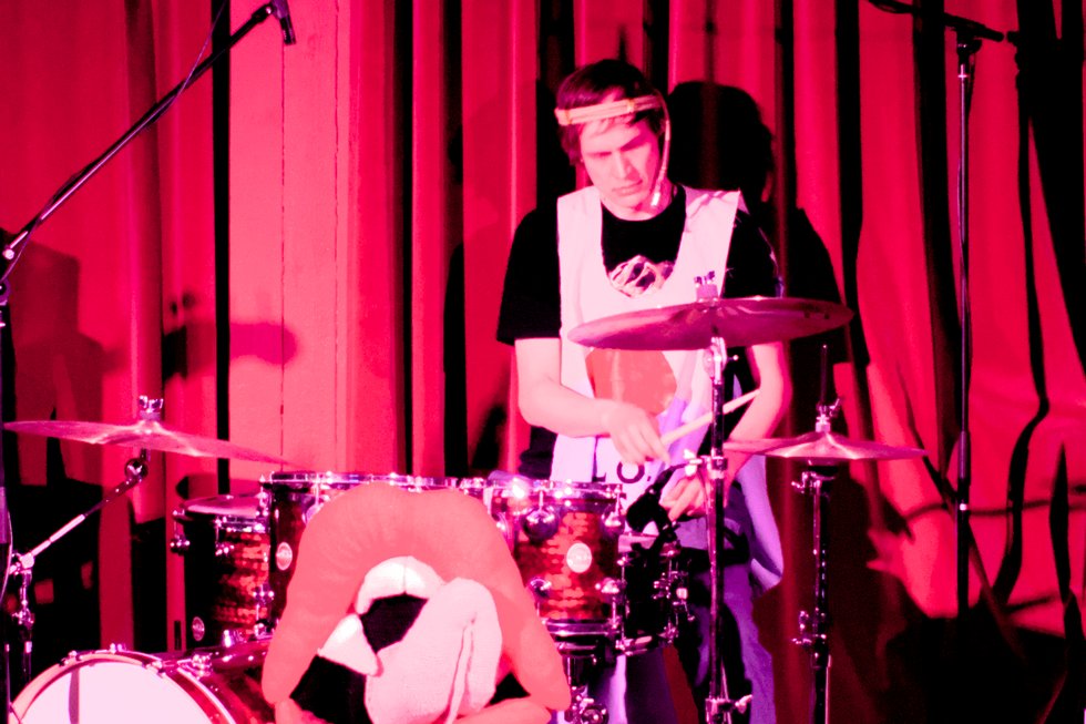 Ari playing the drums